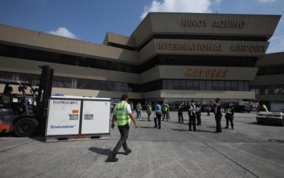 <p><strong>PRIVATE ORDER.</strong> The private sector-procured 575,800 doses of AstraZeneca vaccines arrive at the Ninoy Aquino International Airport Terminal 1 in Pasay City on Friday morning (Aug. 13, 2021). A total of 1.5 million doses of the British-Swede brand is expected by private corporations this month. <em>(PNA photo by Avito Dalan)</em></p>