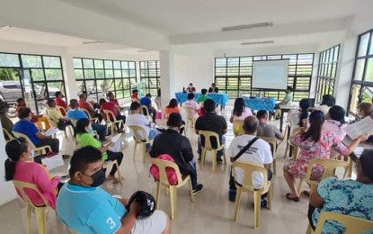 <p><strong>AID DISTRIBUTION.</strong> Residents of 27 barangays in Basilisa, Province of Dinagat Islands receive financial assistance from the government in this undated file photo. Iligan City Rep. Frederick Siao on Monday (Dec. 19, 2022) pushed for the creation of new barangays to improve the delivery of basic government services.<em> (Photo provided by Basilisa LGU)</em></p>