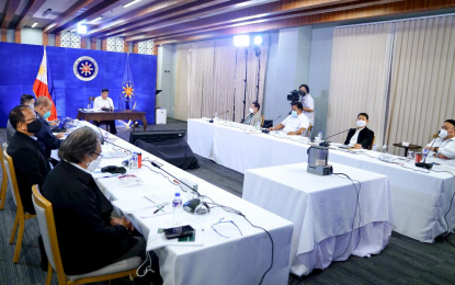 <p><strong>TALK TO THE PEOPLE</strong>. President Rodrigo Roa Duterte presides over a meeting with the Inter-Agency Task Force on the Emerging Infectious Diseases (IATF-EID) core members prior to his talk to the people in Davao City on Aug. 16, 2021. Malacañang said on Tuesday (Aug. 17) said there is nothing wrong with the late airing of pre-recorded Talk to the People every Monday night since people can still watch replay on state-run PTV-4 every Tuesday morning. <em>(Presidential photo by Roemari Limosnero)</em></p>