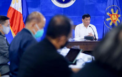 <p><strong>GET VACCINATED.</strong> President Rodrigo Roa Duterte delivers his weekly Talk to the People at the Arcadia Active Lifestyle Center in Matina, Davao City on Monday night (Aug. 16, 2021). Duterte said while the government cannot arrest those who refuse to get vaccinated, he warned that Covid-19 may just “circulate in the air for years” if they refused to get inoculated and observe minimum public health standards. <em>(Presidential photo by Joey Dalumpines)</em></p>