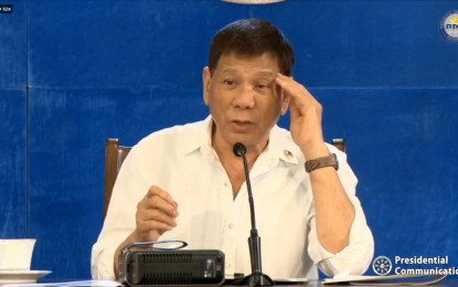 <p><strong>COA REPORT.</strong> President Rodrigo R. Duterte tackles the Commission on Audit’s (COA) report on the health department’s deficiency in managing the PHP67.32 billion allocation for the country’s Covid-19 pandemic response during his Talk to the People in Davao City on Monday night (Aug. 16, 2021). He said the deficiency could be attributed to incomplete paperwork. <em>(Screengrab from RTVM)</em></p>