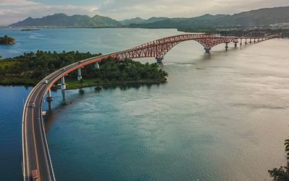 <p><strong>UP FOR IMPROVEMENT</strong>. The aerial view of the San Juanico Bridge, which connects the islands of Leyte and Samar. The national government set aside some PHP87.4 million to carry out another phase of a major rehabilitation of the 50-year-old San Juanico Bridge, the Department of Public Works and Highways regional office here said on Friday (July 29, 2022). <em>(Photo courtesy of Lyle Arañas)</em></p>