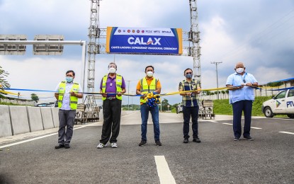 <p><strong>CALAX SUBSECTION 5.</strong> Public Works and Highways Secretary Mark Villar (center) leads the opening of Cavite-Laguna Expressway (CALAX) subsection 5 in Cavite on Tuesday (Aug. 24, 2021). Villar said the 5.14-kilometer subsection of the project will cater to around 5,000 motorists everyday. (Photo from DPWH)</p>