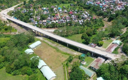 <p><strong>BRIDGE TO PEACE.</strong> The Jipapad Bridge in Eastern Samar. The opening of this PHP250 million bridge within the highway that links Eastern Samar and Northern Samar on Monday (Aug. 23, 2021) is expected to curb insurgency in the two provinces.<em> (Photo courtesy of Department of Public Works and Highways)</em></p>