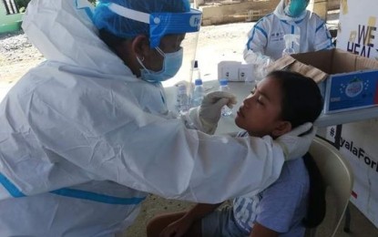 <p><strong>MASS TESTING</strong>. A total of 1,647 individuals underwent swab testing during the first day of the aggressive community testing on Tuesday (Aug. 24, 2021) in the towns of Flora and Sta. Marcela in Apayao. The aggressive community testing was sought by the provincial government after the province continued to log a spike in Covid-19 cases. (<em>Photo courtesy of Jerzon Sebastian/ PGO</em>) </p>