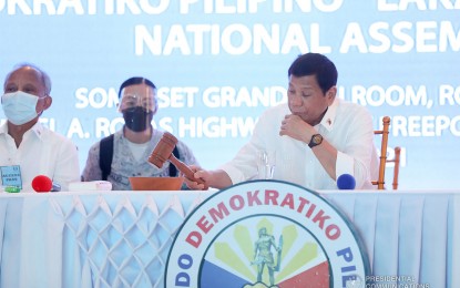 <p><strong>STILL THE CHAIR.</strong> President Rodrigo Duterte bangs the gavel during the PDP-Laban assembly at Royce Hotel in Clark, Pampanga on July 17, 2021. Party secretary-general Melvin Matibag said in a statement on Sunday (Aug. 29) that the President remains the ruling party chair, disregarding a national council election that installed Senator Koko Pimentel III to replace Duterte. <em>(Presidential photo)</em></p>