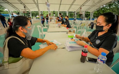 <p><strong>CASH AID.</strong> The Quezon City government concluded its enhanced community quarantine financial aid distribution on Aug. 28, but there are still unclaimed funds. The local government said they have until Tuesday (Aug. 31, 2021) to claim the assistance.<em> (Photo courtesy of QC Government Facebook)</em></p>