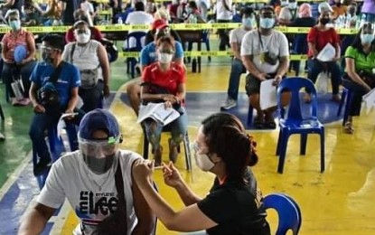 <p><strong>FULL PROTECTION.</strong> Second doses of the Covid-19 vaccine are administered for the cooperative sector at the St. Peter College of Toril, Davao City on Tuesday (Aug. 31 202). The ‘Coop Resbakuna’ activity will be held until Sept. 1 for at least 1,252 vaccinees. <em>(Photo courtesy of Davao-CIO)</em></p>