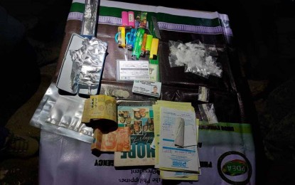 <p><strong>BUY-BUST.</strong> Authorities seize more than 100 grams of shabu worth PHP700,000 from two suspects in a buy-bust in Bayugan City, Agusan del Sur on Tuesday (Aug. 31, 2021). PDEA-13 director Emerson Rosales lauded the success of the operation and the support of the Philippine National Police in Agusan del Sur to the anti-drug drive. <em>(Photo courtesy of PDEA-13)</em></p>