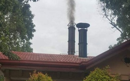 <p><strong>SMOKE.</strong> Dark smoke is seen coming out of the crematorium facility owned by a private company in Cagayan de Oro City on Wednesday (Sept. 1, 2021) during the inspection of the City Local Environment and Natural Resources Office (Clenro). Armen Cuenca, chief of Clenro, said the management of the facility would voluntarily stop its operation Thursday (Sept. 2, 2021) to make some adjustments in compliance with health and safety protocols, following some complaints from the nearby community. <em>(Photo courtesy of Clenro)</em></p>