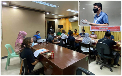 <p><strong>EMBARKING ON NEW CROPS.</strong> Farming group leaders in three upland towns in Maguindanao - South Upi, North Upi, and Datu Odin Sinsuat - listen intently as BBOI Chairman Ishak Mastura (inset) briefed them to try on new crops, particularly Cavendish banana, to enhance their income amid the pandemic, during a meeting on Wednesday (Sept. 1, 2021). The farmers, in return, agreed to try the Cavendish banana plantation technology in their respective areas.<em> (Photo courtesy of BBOI-BARMM)</em></p>