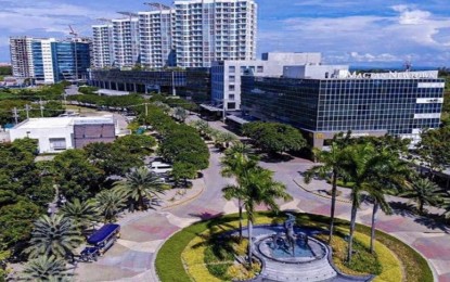 <p><strong>OFFICE SECTOR</strong>. Photo shows the Mactan Newtown, a township development in Lapu-Lapu City and is home to office and residential buildings. Megaworld Corp., owned by tycoon Andrew Tan, on Thursday (Sept. 2, 2021) reported the “strength and resilience of the office market” as BPO companies opted to stay and held on to their spaces. <em>(Contributed photo)</em></p>
