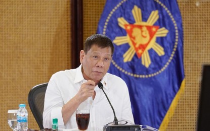 <p>President Rodrigo Roa Duterte presides over a meeting with the Inter-Agency Task Force for the Management of Emerging Infectious Diseases core members prior to his talk to the people at the Malacañang Palace on September 7, 2021. (<em>King Rodriguez/ PRESIDENTIAL PHOTO</em>)</p>