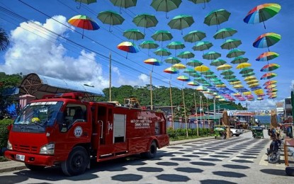 <p><strong>'REKORIDA'.</strong> The Baganga Fire Station deploys one of its fire trucks with a mobile public address system on Wednesday (Sept. 8, 2021) in Barangay Central in Baganga, Davao Oriental. The activity aims to remind and encourage people to observe the minimum health protocol under the general community quarantine (GCQ) status of the province. <em>(Photo courtesy of Baganga BFP)</em></p>