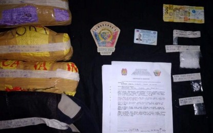 <p><strong>ILLEGAL DRUGS.</strong> Operatives of the Zamboanga City Police Office (ZCPO) seize some PHP273,600 worth of illegal drugs from suspect Fahad Sabtal in an anti-drug operation early Wednesday (Sept. 8, 2021) in Barangay San Roque, Zamboanga City. The confiscated illegal drugs include 27 grams of shabu and 750 grams of dried marijuana leaves. (Photo courtesy of ZCPO's Station 7)</p>