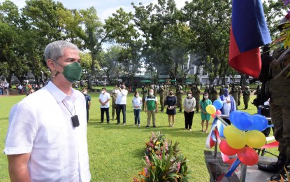 <p><strong>PAYING TRIBUTE</strong>. Negros Occidental Governor Eugenio Jose Lacson leads the wreath-laying ceremony at the Monument of World War II Veterans inside the Capitol Lagoon and Park in Bacolod City on Thursday (Sept. 9, 2021). The event commemorated the 76th Negros Island Victory Day and paid tribute to the gallantry and patriotism of Negrense veterans who liberated the island after fighting against the Japanese Imperial Army. <em>(Photo courtesy of PIO Negros Occidental)</em></p>