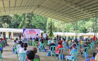 <p><strong>SERVING URBAN POOR</strong>. Some 700 urban poor residents from Makilala, North Cotabato attend the formal opening of the Presidential Commission for the Urban Poor (PCUP) mini-caravan services program on Wednesday afternoon (Sept. 8, 2021). Caravan coordinators strictly implemented the observance of social distancing and health protocols during the program at the Barangay Poblacion gymnasium. <em>(Photo courtesy of Makilala LGU)</em></p>