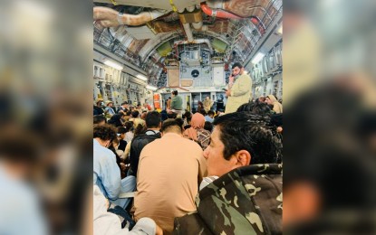 <p><strong>FLEEING FOR SAFETY.</strong> Inside the US C-17 plane that transported fleeing Afghans to Doha, Qatar. The United Nations High Commissioner for Refugees and the United States government praised the Philippines for opening its doors to refugees fleeing Afghanistan to escape the Taliban rule. <em> (Photo courtesy of Grace Gallora)</em></p>
