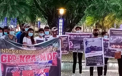 <p><strong>NO TO REDS.</strong> Members of Masbate youth organizations denounce communist terrorist groups in this undated photo. Young Filipinos have been more active in denouncing communist terrorist groups’ recruitment in campuses and indigenous peoples’ communities. <em>(Photo courtesy of Masbate CPS)</em></p>