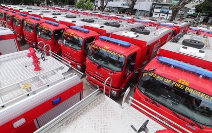 <p><strong>BOOSTING FIRE RESPONSE.</strong> Fire trucks are parked at a fire station in this undated photo. The Bureau of Fire Protection on Monday night (May 20, 2024) thanked the Department of Budget for the release of PHP2.880 billion in funds for new fire trucks and emergency vehicles, stressing that it would boost its modernization and emergency response efforts.<em> (File photo courtesy of BFP)</em></p>