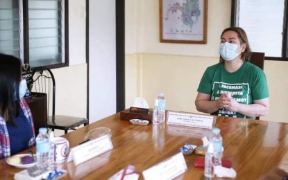 <p><strong>PEACE INITIATIVES.</strong> Davao City Mayor Sara Duterte (left) meets with former rebel Ariane Jane Ramos at a Philippine Army camp in Paquibato District on Sept. 10, 2021. Ramos surrendered on August 1, saying she is tired of fighting and worried about her mental health. <em>(Photo courtesy of Mayor Inday Sara Duterte Facebook)</em></p>