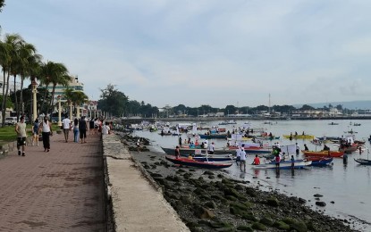 <p><strong>PROTEST ACTION</strong>. Fisherfolk protest the proposed P23-billion offshore reclamation project in Dumaguete City in this file photo. On Sunday (Sept. 12, 2021), they held a fluvial protest parade that ended at the Rizal Boulevard in the Negros Oriental capital. <em>(PNA photo by Judy Flores Partlow)</em></p>