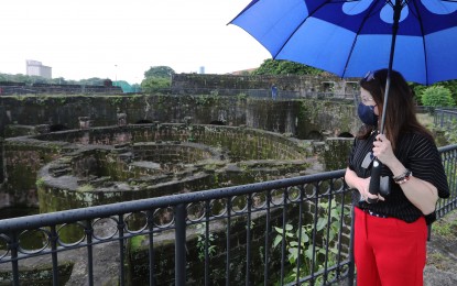 <p><strong>REVIVING TOURISM.</strong> Tourism Secretary Bernadette Romulo-Puyat leads the reopening of three Intramuros site on Thursday (Sept, 16, 2021). NCR residents who are fully vaccinated against Covid-19 can use the Express Lane when visiting Baluarte de San Diego or Fort Santiago to speed up their entry. <em>(PNA photo by Joseph Razon)</em></p>