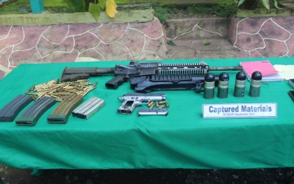 <p><strong>SEIZED</strong>. The firearms and ammunition confiscated from two New People’s Army leaders and two other members who were arrested in Alagatan village, Gingoog City, Misamis Oriental on Thursday (Sept. 16, 2021). The Satur couple is considered high-value targets and tagged as most wanted persons, both facing three counts of murder and frustrated murder. <em>(Photo courtesy of 58th Infantry Battalion, Philippine Army)</em></p>