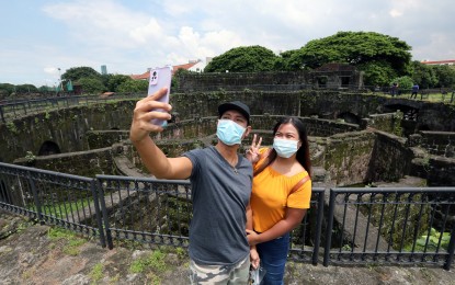 <p><strong>BEST CITIES.</strong> Visitors take their selfie inside the historic Fort Santiago in Intramuros. Manila takes the 34th spot in Time Out's 53 best cities in the world.  <em>(PNA file photo)</em></p>
