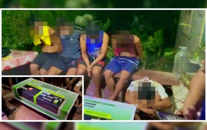 <p><strong>BUSTED.</strong> The five drug suspects, including a minor, bow their heads after an anti-drug operation in Barangay Awang, Datu Odin Sinsuat, Maguindanao on Thursday (Sept. 16, 2021). Seized from the group (inset) were PHP102,000 worth of suspected shabu, drug paraphernalia, and mobile phones. <em>(Screengrab from Brigada News FM Cotabato FB page)</em></p>