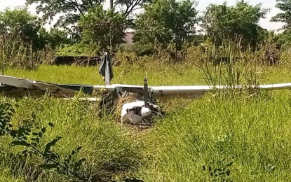 <p><strong>PLANE ACCIDENT</strong>. A two-seater Cessna 152 aircraft crashed at a vacant lot in Barangay Agnaya, Plaridel town in Bulacan on Friday (Sept. 17, 2021). One of the plane's wings reportedly hit an acacia tree, resulting in the accident. The pilot and co-pilot suffered minor injuries. <em>(Photo courtesy of Plaridel Quick Response Team)</em></p>