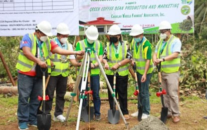 <p><strong>HOPE FOR COFFEE GROWERS</strong>. Department of Agriculture (DA) Undersecretary Zamzamin Ampatuan Jr. (2nd from right), DA 13 (Caraga) Executive Director Abel James Monteagudo (far right), and Las Nieves Mayor Avelina Rosales (3rd from right) lead the groundbreaking ceremony for the construction of a PHP19-million coffee processing center in Casiklan, Las Nieves, Agusan del Norte on Friday (Sept. 17, 2021). The processing center is funded under the Philippine Rural Development Program of the agriculture department. <em>(Photo courtesy of DA-13 Information Office)</em></p>