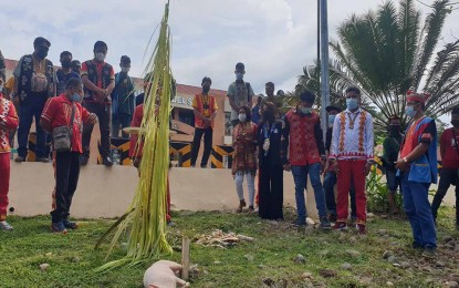 <p><strong>TRADITION.</strong> Leaders of the Manobo tribe in Surigao del Sur perform the ‘boney’ ritual in Tandag City to condemn the violations of Bayan Muna party-list Representative Eufemia Cullamat against their members on Sunday afternoon (Sept. 19, 2021). They said Cullamat misrepresented the tribe and maligned the National Commission on Indigenous Peoples and its chair, Secretary Allen Capuyan. <em>(Photo courtesy of PIA-Surigao del Sur)</em></p>
