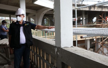<p><strong>INSPECTION.</strong> Task Force Bangon Marawi chief, Secretary Eduardo del Rosario, checks on the ongoing construction of a mosque in Marawi City on Sept. 15, 2021. Del Rosario said rehabilitation works in the city that was destroyed during the 2017 siege are 80-percent complete. <em>(Photo courtesy of TFBM)</em></p>