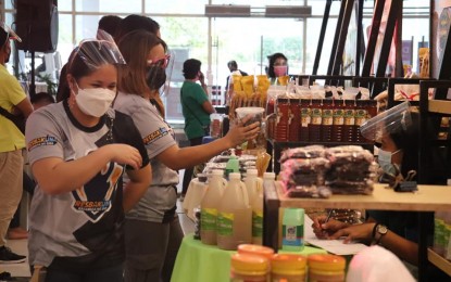 <p><strong>TRADE FAIR</strong>. Buyers visit the Bahandi Trade Fair at Robinsons Place Tacloban in this Sept. 18, 2021 photo. The first face-to-face Eastern Visayas regional trade fair held this pandemic has surpassed its sales target, benefitting 41 micro small and medium enterprises in the region, the Department of Trade and Industry reported on Wednesday (Sept. 22). <em>(Photo courtesy of DTI Region 8)</em></p>