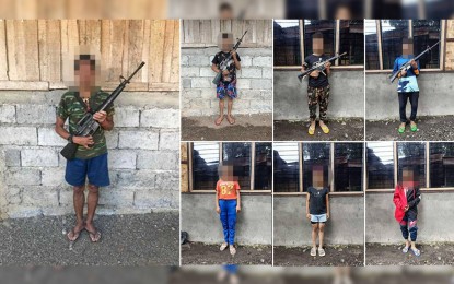<p><strong>REBELS YIELD.</strong> Seven members of the New People’s Army surrender to the 60th Infantry Battalion in Davao del Norte on Monday. The seven, including two minors, also turned over high-powered firearms. <em>(Photo courtesy of 10th Infantry Division)</em></p>