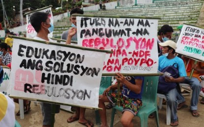 <p><strong>ENDING REBELLION</strong>. Former rebels in Northern Samar join a protest against the New People's Army (NPA) in this Aug. 20, 2021 photo. The surrender of over 2,000 members and supporters of the NPA in Northern Samar in the past three months has further weakened the communist terrorist group in Samar Island, a military official said on Friday (Sept. 24, 2021).<em> (Photo courtesy of Philippine Army)</em></p>
