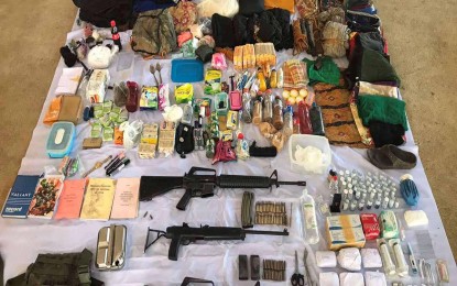 <p><strong>WAR MATERIEL.</strong> High-powered firearms, ammunition, and medical supplies were among the materials seized by the 36th Infantry Battalion after a skirmish in Sitio Agsam, Barangay Cabas-an, Cantilan, Surigao del Sur last Sept. 21. Two NPA rebels were also killed during the encounter which was the result of a tip-off provided by civilians. <em>(Photo courtesy of 36IB)</em></p>