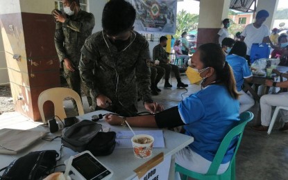 <p><strong>CARAVAN OF SERVICES.</strong> Free medical check-up was among the services offered to residents of Barangay Aplaya in Dingalan, Aurora during the conduct of 'Serbisyo Caravan' on Monday (Sept. 27, 2021). Serbisyo Caravan is in line with President Rodrigo Duterte's Executive Order 70 institutionalizing the whole-of-nation approach to bring government services closer to the people. <em>(Photo courtesy of the Army's 91st IB)</em></p>