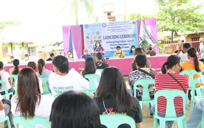 <p><strong>SKILLS TRAINING</strong>. Romelia Nuezca, acting director of TESDA-Negros Occidental, delivers her message to the participants of skills training courses from four insurgency-cleared villages in Escalante City, during the launch rites held in Barangay Mabini on Sept. 24, 2021. A total of 99 individuals have been identified as beneficiaries of the training program. <em>(Photo courtesy of TESDA-Negros Occidental)</em></p>