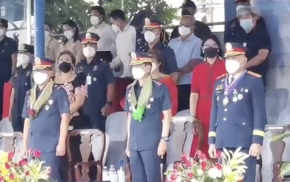 <p><strong>NEW PRO-7 CHIEF</strong>. Philippine National Police (PNP) chief, Gen. Guillermo Eleazar (center), leads the turnover of command and retirement ceremony of Brig. Gen. Ronnie Montejo (right) at the Police Regional Office (PRO-7) in Camp Sergio Osmeña Sr., Cebu City on Wednesday (Sept. 29, 2021). Brig. Gen. Roque Eduardo Vega (left) assumed the post as the new PRO-7 chief. <em>(Screengrab from PRO-7 video)</em></p>