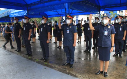 <p><strong>NEW PNP OFFICERS.</strong> A total of 117 licensed professionals take their oath as police officers in Camp Crame on Monday (Oct. 4, 2021). The newly appointed police commissioned officers were formally turned over to the Directorate for Human Resource and Doctrine Development (DHRDD) to undergo the mandatory Officers' Basic Course and Field Training Program before reporting to their respective unit assignments. <em>(Photo courtesy of PNP)</em></p>