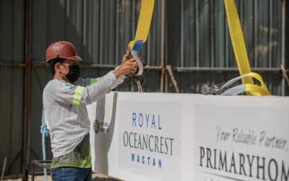 <p><strong>REAL ESTATE PROSPECTS</strong>. This photo shows a construction worker at the project site of a condominium project in Barangay Basak, Lapu-Lapu City, a growing property market in Cebu due to the upcoming third bridge and its proximity to the international airport. Ramero Espina, vice president for sales and marketing of developer Primary Homes Inc., on Monday (Oct. 4, 2021) says the outlook for real estate investment in Cebu remains robust, driven by big infrastructure projects coming to the country’s second-biggest metropolitan area. <em>(Contributed photo)</em></p>