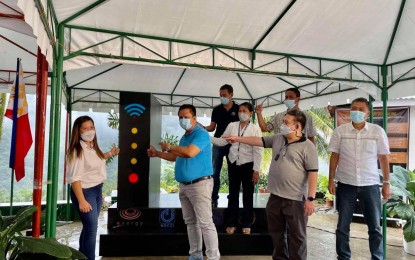<p><strong>PH'S FIRST E-COMMUNITY</strong>. The first off-grid electronic community in the Philippines in Barangay Puhagan in Valencia, Negros Oriental, was formally launched Monday (Oct. 4, 2021) by the Energy Development Corporation (EDC), Department of Information and Communications Technology, and other partners. Norreen Bautista, EDC Corporate Social Responsibility head for Negros, and Governor Roel Degamo led the on-site switch-on ceremony. <em>(Photo courtesy of Irma Faith Pal)</em></p>