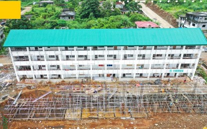 <p><strong>ONGOING CONSTRUCTION.</strong> The progress of the four-story, 20-classroom integrated school building in Barangay Moncado Kadingilan, Marawi City, Lanao del Sur as of September 2021. The construction is implemented by the Department of Public Works and Highways and the Department of Education and funded through the National Disaster Risk Reduction and Management-Marawi Recovery, Rehabilitation, and Reconstruction Program. <em>(Photo courtesy of TFBM/NHA)</em></p>