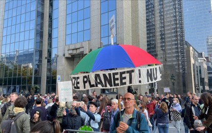 <p><strong>CLIMATE CHANGE AWARENESS.</strong> Protesters take part in a demonstration against climate change in Brussels, on Oct. 10, 2021. Crowds chanted slogans on combating climate change with the participation of nearly 80 non-governmental organizations.<em> (Dursun Aydemir-Anadolu Agency)</em></p>