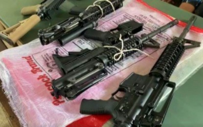 <p><strong>SEIZED FIREARMS.</strong> Some of the high-powered firearms seized from five suspected gun-runners in Maguindanao on Tuesday (Oct. 12, 2021). Several of the confiscated firearms were issued by the government to military and police personnel. <em>(Photo courtesy of Datu Odin Sinsuat MPS)</em></p>