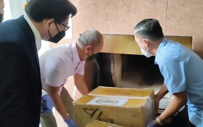<p><strong>DRUG DESTRUCTION</strong>. Lapu-Lapu City Executive Judge Joseph Stephen Ygnacio (left) witnesses the destruction of PHP62.3-million worth of illegal drugs led by PDEA-7 regional director Levi Ortiz (center). Destroyed during the activity on Thursday (Oct. 14, 2021) were more than eight kilograms of shabu, over 177 grams of marijuana and more than 20 milliliters of nubain. <em>(Photo courtesy of PDEA-7)</em></p>