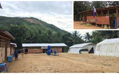 <p><strong>F2F PILOT SCHOOL.</strong> Preparations are underway at the remote Bato Elementary School in Makilala, North Cotabato, including the setting up of temporary learning shelters (inset), where face-to-face classes will be piloted starting Nov. 15, 2021. Officials said no coronavirus disease 2019 cases have been recorded in the village since the pandemic was declared in March last year. <em>(Photo by Johan Andrew Tabugoc – PNA Cotabato)</em></p>