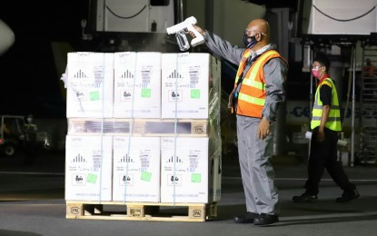 <p><strong>NEW DELIVERY.</strong> Boxes containing 862,290 doses of the Pfizer Covid-19 vaccine are disinfected at the Ninoy Aquino International Airport Terminal 3 in Pasay City on Friday (Oct. 15, 2021). As of October 16, the Philippines has received 91,339,530 doses. <em>(PNA video by Robert Oswald P. Alfiler)</em></p>